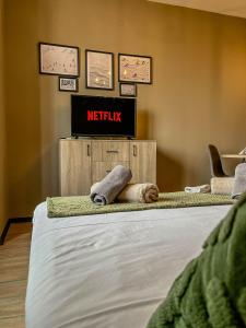 Postel nebo postele na pokoji v ubytování Tarein Studio