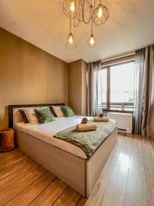 Postel nebo postele na pokoji v ubytování Tarein Studio