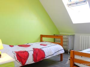 a green bedroom with a bed and a dresser at Longère rénovée avec piscine privée, Wi-Fi et climatisation - FR-1-489-201 in Échassières +23 photos