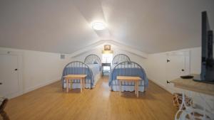 En eller flere senge i et værelse på Xander Haus - Monthly Rental