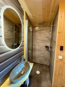 a bathroom with a sink and a mirror at House on Dundret in Gällivare
