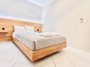 Ένα ή περισσότερα κρεβάτια σε δωμάτιο στο ITHACA 3rd floor apartment with a view