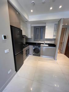 Kuchyň nebo kuchyňský kout v ubytování Jw Marriott residence