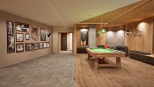 Biliár nebo kulečník v ubytování Résidence Odalys L'Ecrin Blanc