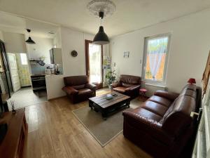 Coin salon dans l'établissement Family home le 31