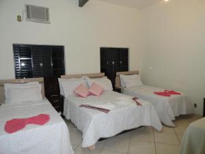 Postel nebo postele na pokoji v ubytování Hotel Royal Class