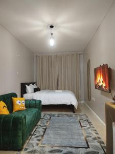 Ένα ή περισσότερα κρεβάτια σε δωμάτιο στο Chacha Homes Kiambu Road