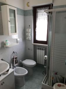 Koupelna v ubytování Holihome Sofy Mare