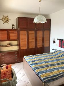 Postel nebo postele na pokoji v ubytování Holihome Sofy Mare