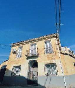 a building with balconies on the side of it at La Casa De Los Gatetes in Dúrcal