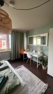 Ένα ή περισσότερα κρεβάτια σε δωμάτιο στο Urban chic in Gerresheim, a place to feel good +15 φωτογραφίες