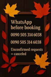 a sign that reads whatever app before booking with autumn leaves at Ayvalik Seafront Villa Mansion Summer House in Ayvalik in Ayvalık
