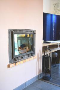 TV a/nebo společenská místnost v ubytování La Serenidad