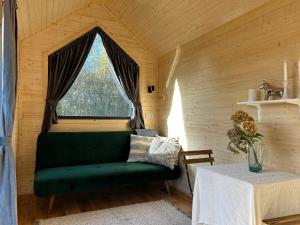 Una cama o camas en una habitación de Tiny Escape Vassingso by Tiny Away