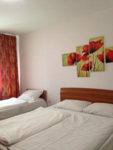 Postel nebo postele na pokoji v ubytování Mellys Haus