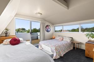 Ένα ή περισσότερα κρεβάτια σε δωμάτιο στο Beautiful Large Central Napier Home