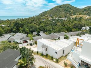 an aerial view of a white building at Staylar Sunrise Villas - Chaweng Noi, Koh Samui in Amphoe Koh Samui