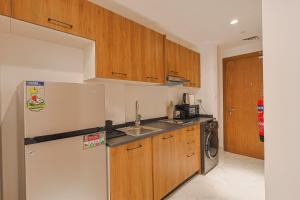 Nhà bếp/bếp nhỏ tại Traveler's Haven Studio - Masdar City +5 ảnh