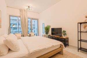 TV/trung tâm giải trí tại Traveler's Haven Studio - Masdar City