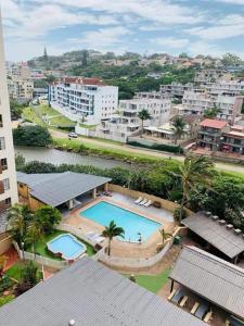 an overhead view of a swimming pool in a city at Santana Resort 401 in Margate
