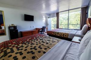 Ένα ή περισσότερα κρεβάτια σε δωμάτιο στο Budget Inn Greenville By Hotel O I-85 +22 φωτογραφίες