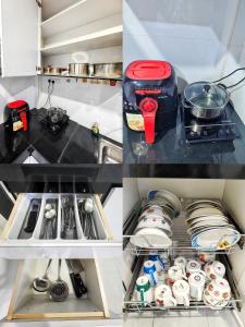 - une cuisine équipée d'une cuisinière et de quelques plats dans l'établissement Fun Fun Stay Tangkak by GX Homestay, à Tangkak 13 autres photos