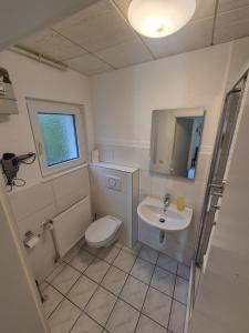 Koupelna v ubytování Rheinblick 3-Zimmer Apartment + 6 fotografií