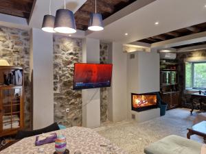 Et tv og/eller underholdning på Filia Country House Family and Group Friendly Vacation Rental