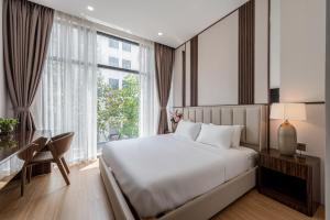 Ένα ή περισσότερα κρεβάτια σε δωμάτιο στο AviCasa