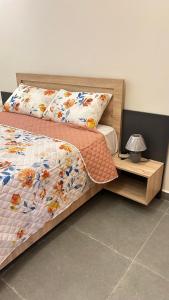 Ένα ή περισσότερα κρεβάτια σε δωμάτιο στο Appartement de luxe 1