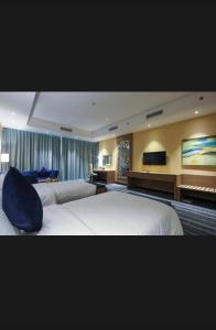 Postel nebo postele na pokoji v ubytování Shahm