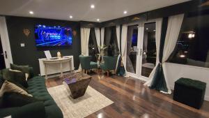 Χώρος καθιστικού στο Carberry Lodge