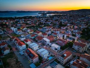 an aerial view of a city at sunset at Villa Essenza Rossa in Vodice only 650 meters from the beach in Vodice