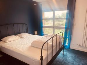 En eller flere senge i et værelse på O Saule -Villa en campagne