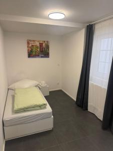 Ένα ή περισσότερα κρεβάτια σε δωμάτιο στο F1- 1 Zimmer Wohnung +9 φωτογραφίες