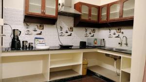 Kuchyň nebo kuchyňský kout v ubytování House of