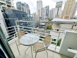 En balkon eller terrasse på Harmony Living Condominium