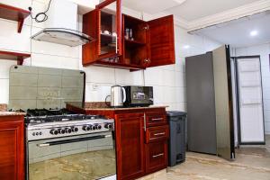 Kuchyň nebo kuchyňský kout v ubytování Résidence le CARAT batiment GOLF