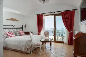 Ένα ή περισσότερα κρεβάτια σε δωμάτιο στο Villa Carminia +32 φωτογραφίες