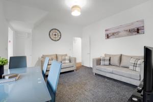 Et opholdsområde på NEW! 4BR in Stanley