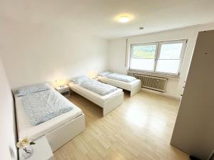 Postel nebo postele na pokoji v ubytování Modern Apartment in Lichtenstein