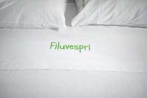 Postel nebo postele na pokoji v ubytování Filuvespri
