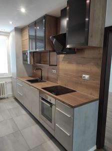 Una cocina o cocineta en Moderný apartmán pri lesoparku