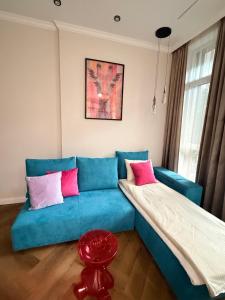 Ένα ή περισσότερα κρεβάτια σε δωμάτιο στο The Giraffe's apartment +32 φωτογραφίες