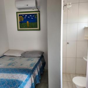 Una cama o camas en una habitación de JM Hotel