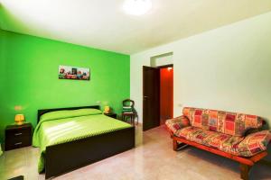 Postel nebo postele na pokoji v ubytování B&B Luna