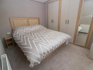 Ένα ή περισσότερα κρεβάτια σε δωμάτιο στο Ellies House