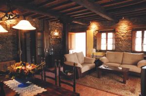 Ein Sitzbereich in der Unterkunft Casa de Aldea La Pumariega