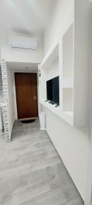 TV a/nebo společenská místnost v ubytování La Maison d'Annette + 2 fotografie