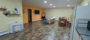 a living room with a kitchen and a dining room at Comoda quinta en El Pato in El Pato +8 photos